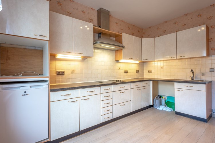 Gelijkvloers appartement met 2 slaapkamers, tuintje en garagebox 