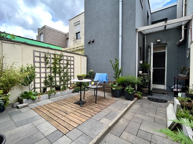 Instapklaar gelijkvloers appartement met tuin 
