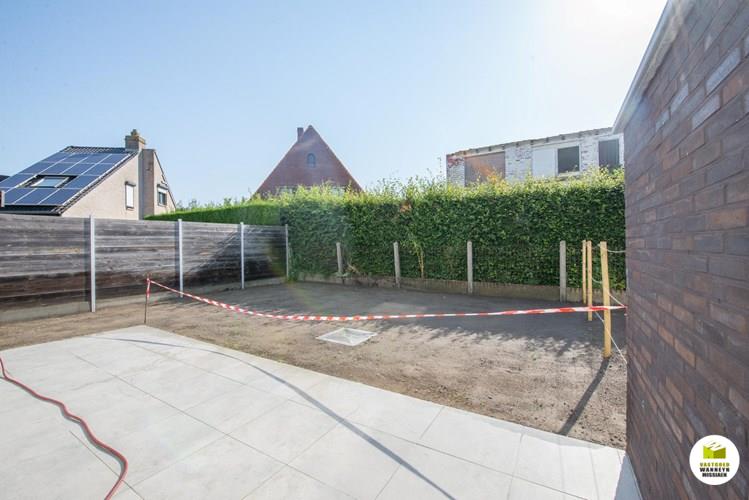 Energiezuinige nieuwbouwwoning met 3 slaapkamers, tuin en carport in rustige straat te Sint-Joris 