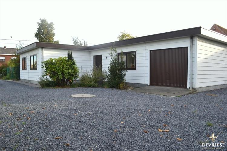 Rustig gelegen gelijkvloerse woning met tuin en garage 