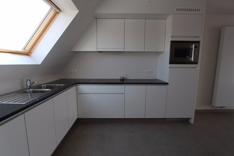 Recent nieuwbouwappartement met 2 slaapkamers en garage in centrum Torhout 