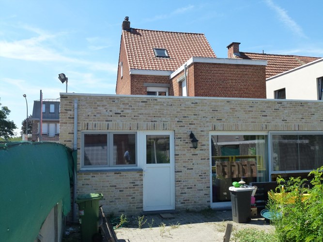 Centraal gelegen woonhuis met tuin en garage 