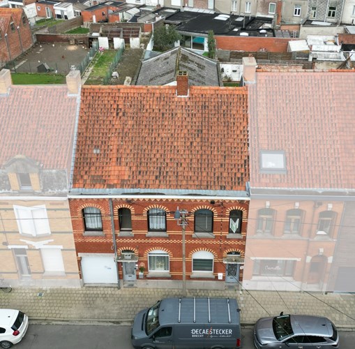 Twee woning met beide 2 slaapkamers, terrassen en loods in het centrum van Roeselare 