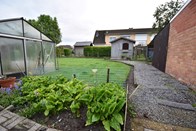 Bungalow -  open bebouwing met garage en tuin te Maldegem 