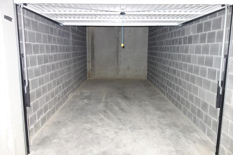 Ondergrondse garagebox in handelscentrum 
