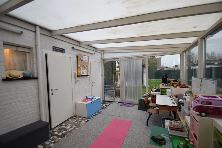 Ruime halfopen 3-slaapkamer-woning met garage en tuin 