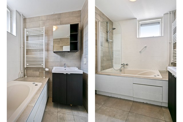 Detailfoto's van de geheel betegelde badkamer met badmeubel, designradiator en bad/douche.