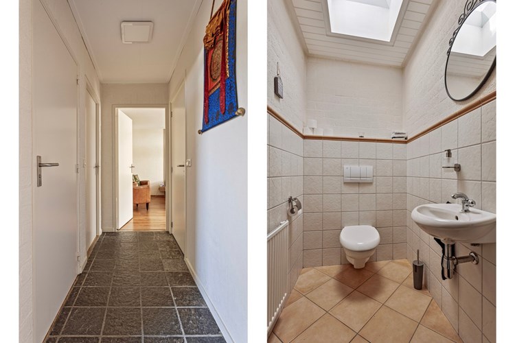 Vanuit de royale ontvangsthal toegang tot het toilet, twee slaapkamers en de badkamer. Ruim toilet met een tegelvloer, gedeeltelijk betegelde wanden en een schroten plafond met een dubbelwandige lichtkoepel. 